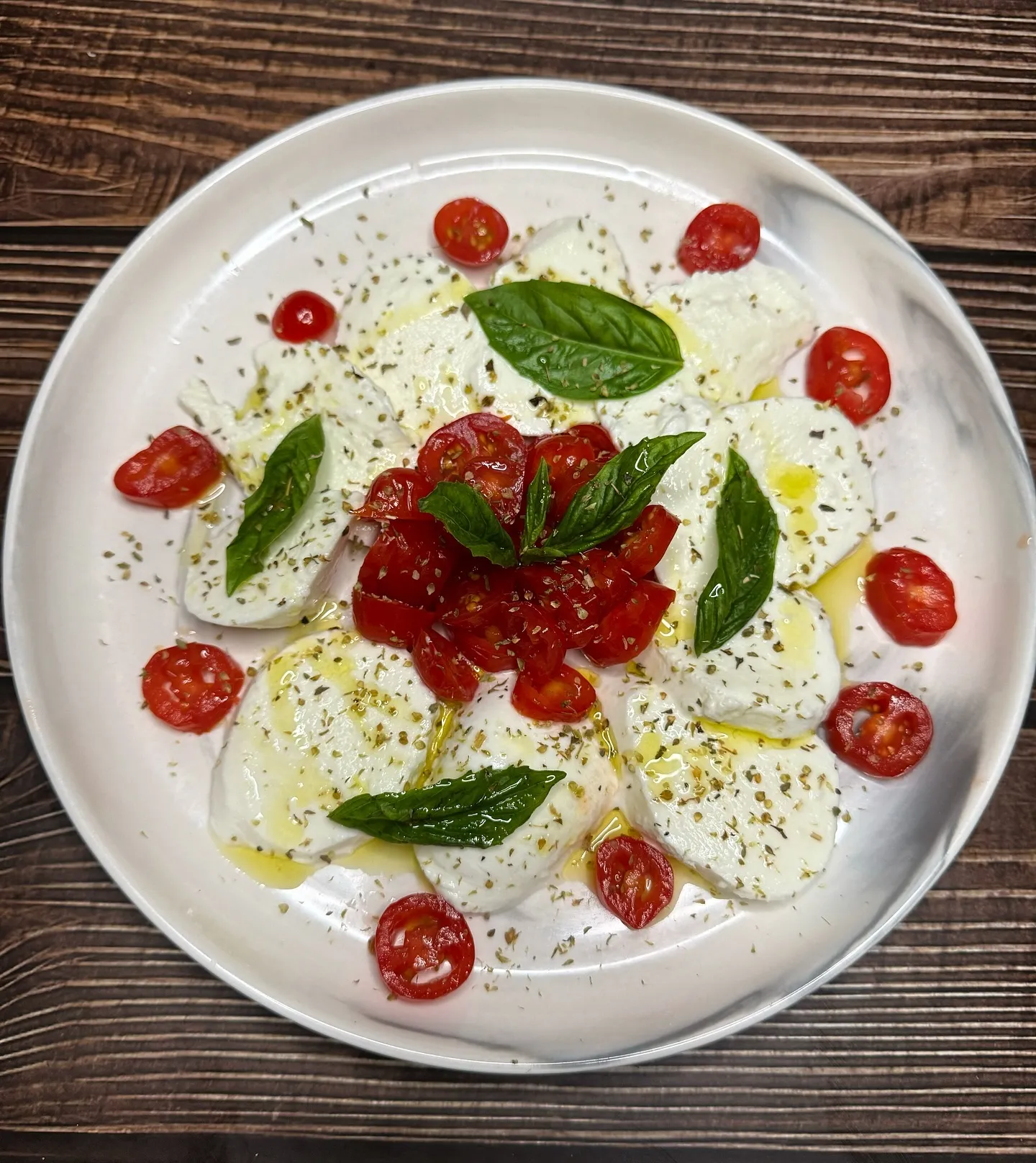 Caprese di Bufala with cherry tomatoes and basil